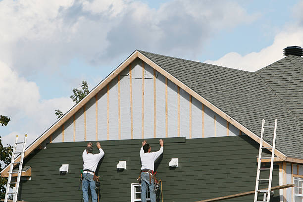 Professional Emergency Siding Repair technician working in Ridge, MD